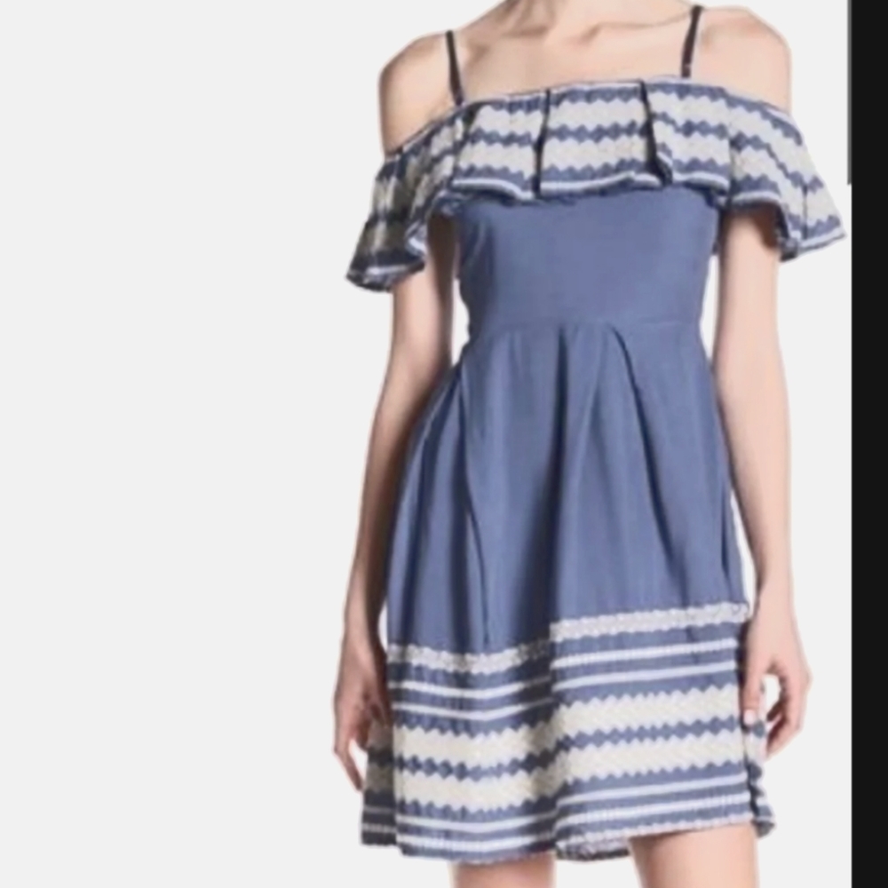 Off the shoulder ruffled dress.